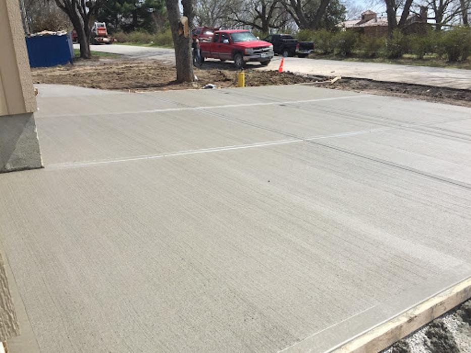 Freshly poured commercial concrete parking pad in the Kansas City area